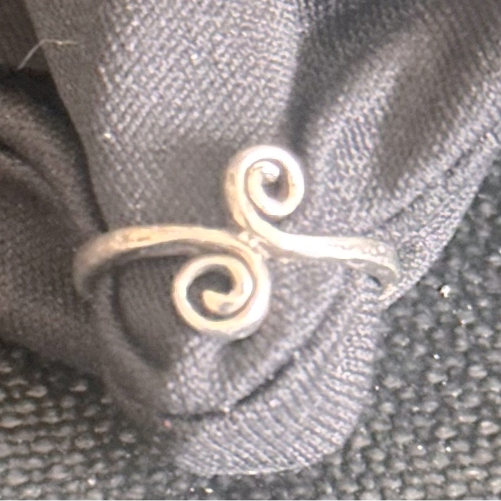 Silver pinky or toe ring currently a 2.5